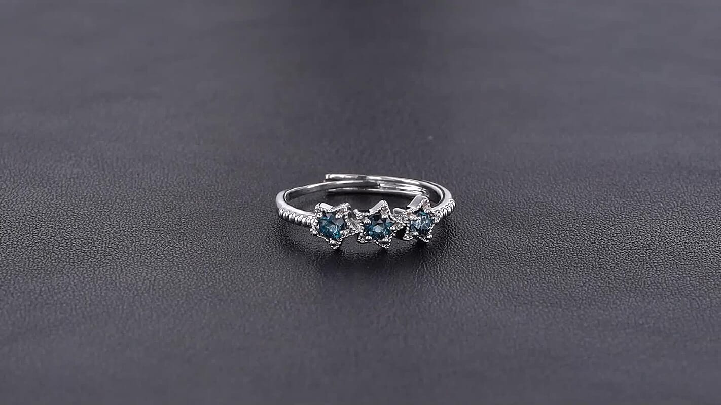 Blue Topaz 0.60 ctw 3 Stone Ring Silvertone (Adjustable)