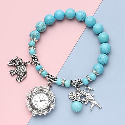 Strada Blue Howlite Beaded, Crystal Japanese Movement Stretch Bracelet Watch with Elephant and Fairy Charm in Silvertone (7-7.50 In) 30.00 ctw