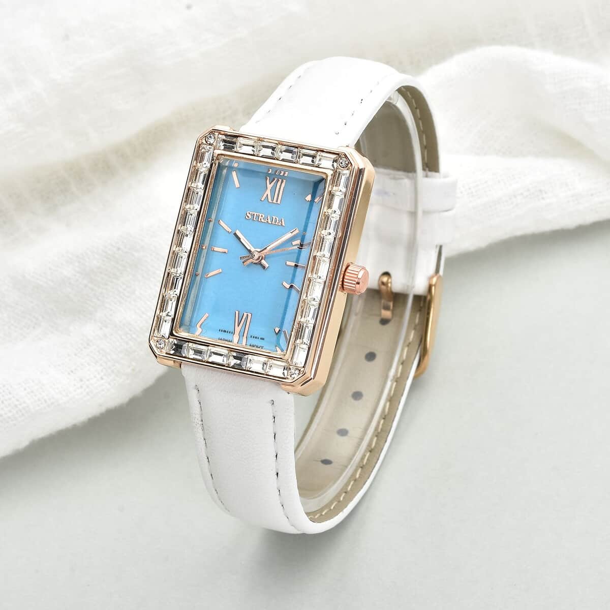 Strada Austrian Crystal Japanese Movement Simulated Turquoise Dial Watch with White Faux Leather Strap (33x26mm) (7.0-8.0Inches) image number 1