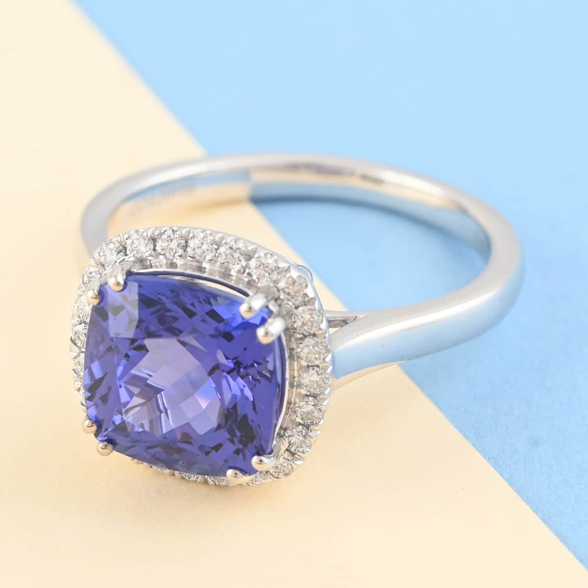RED CARPET COLLECTION Certified and Appraised RHAPSODY 950 Platinum AAAA Tanzanite and E-F VS Diamond Halo Ring (Size 8.0) 5.50 Grams 3.20 ctw image number 1