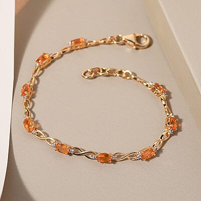 Salamanca Fire Opal and Natural White Zircon Infinity Link Bracelet in Vermeil Yellow Gold Over Sterling Silver (6.50 In) 1.50 ctw