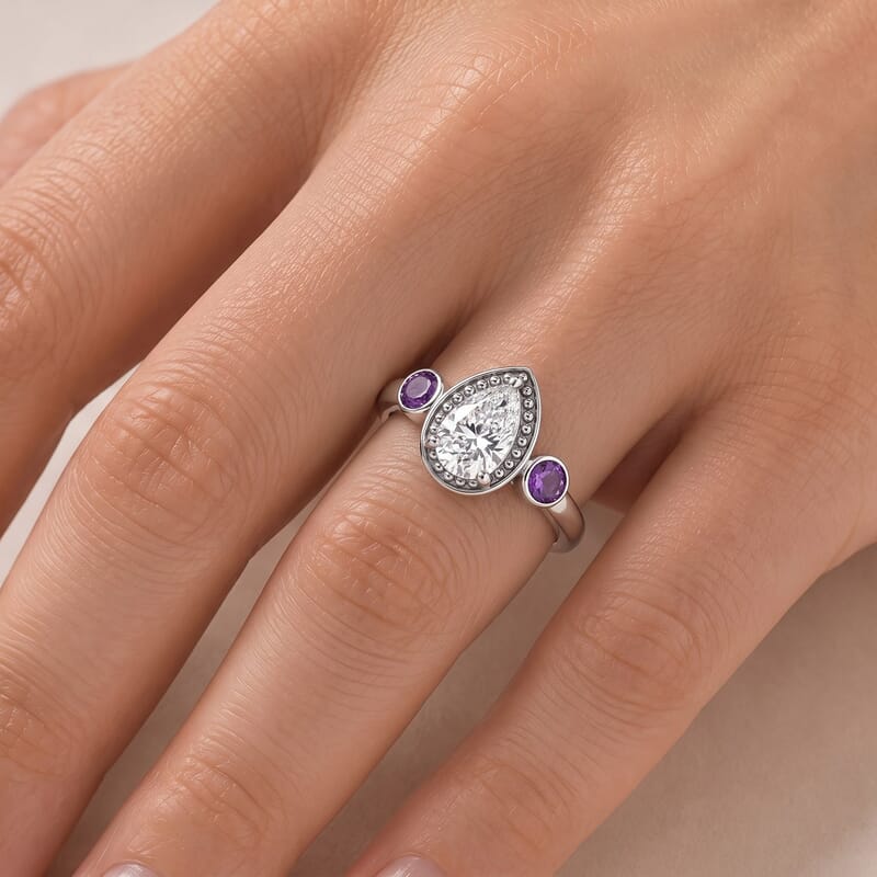 EverTrue Simulated White and Amethyst Color Diamond Halo of Elegance Ring in Stainless Steel (Size 5.0)