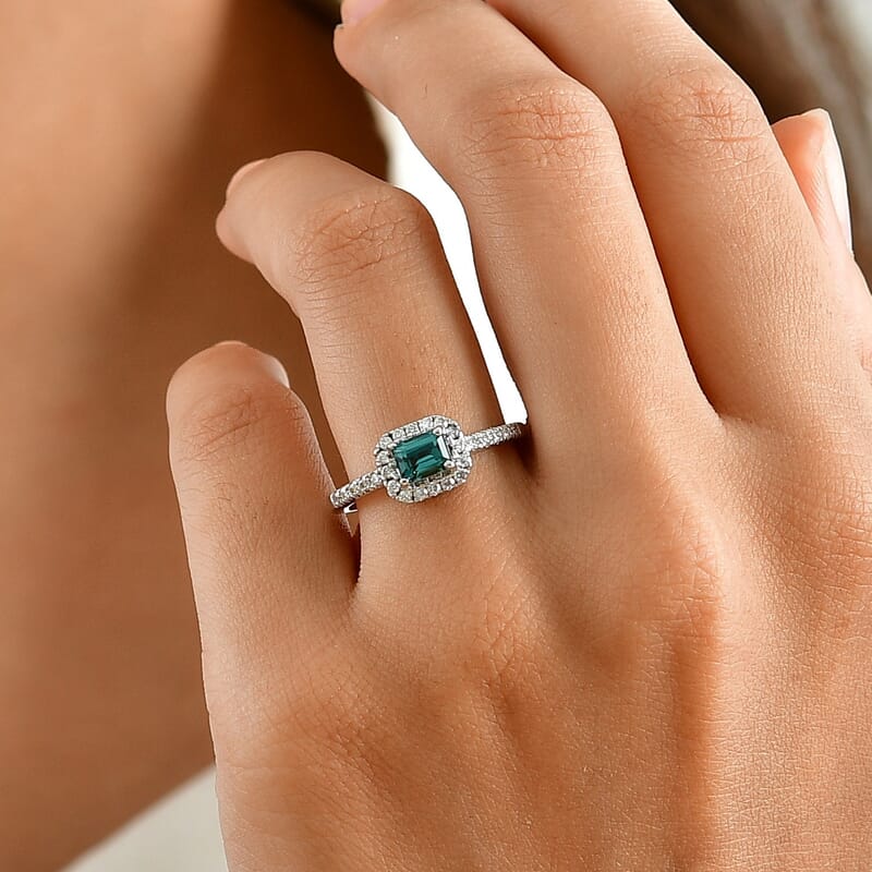 D'Joy AAAA Monte Belo Indicolite and Moissanite 0.80 ctw Classic Halo Elegance Ring in Rhodium Over Sterling Silver (Size 6.0)