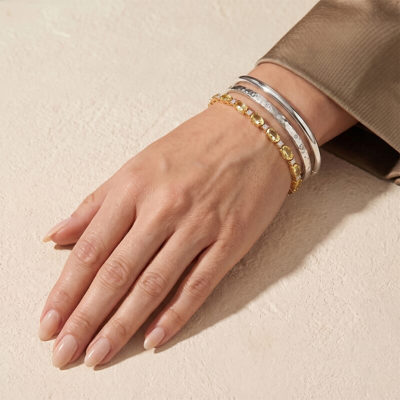D'Joy Premium Malacacheta Sphene and Moissanite 5.50 ctw Tropical Dew Bracelet in 18K Vermeil Yellow Gold Over Sterling Silver (6.50 In)