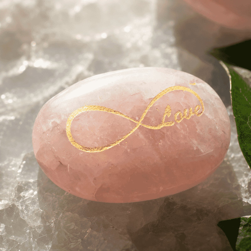 Infinite Rose Quartz Palm Stone 735 ctw