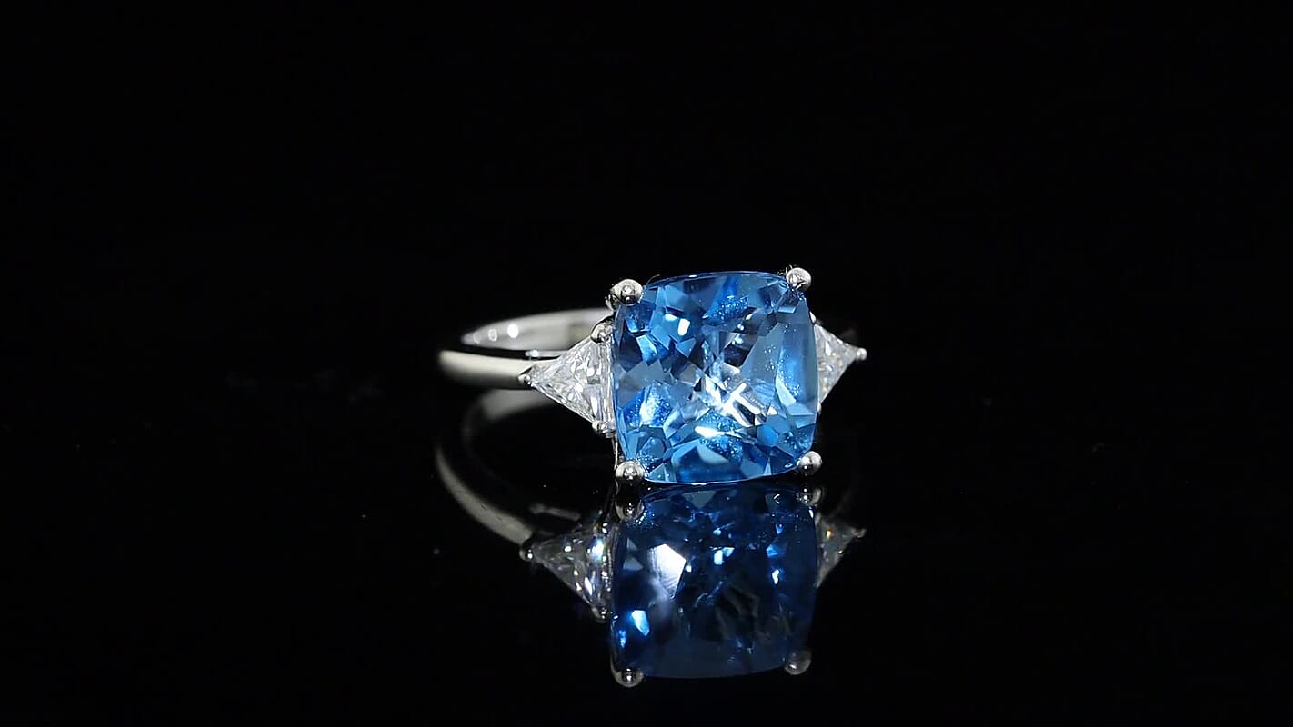 D''Joy Premium Swiss Blue Topaz and Moissanite 5.85 ctw Ring in Rhodium Over Sterling Silver (Size 7.0)