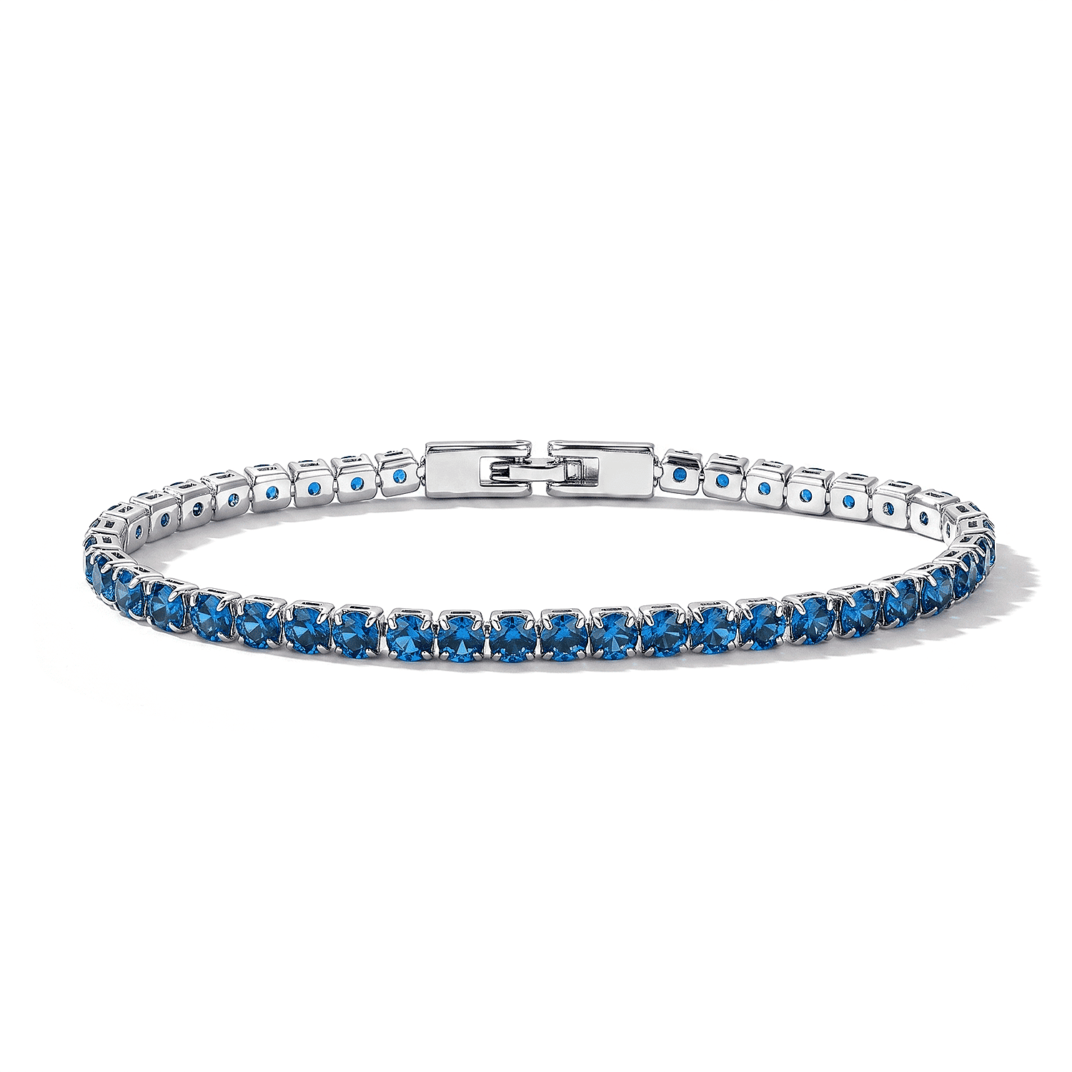 Simulated Blue Sapphire Diamond Tennis Bracelet in Silvertone (7.50 In)