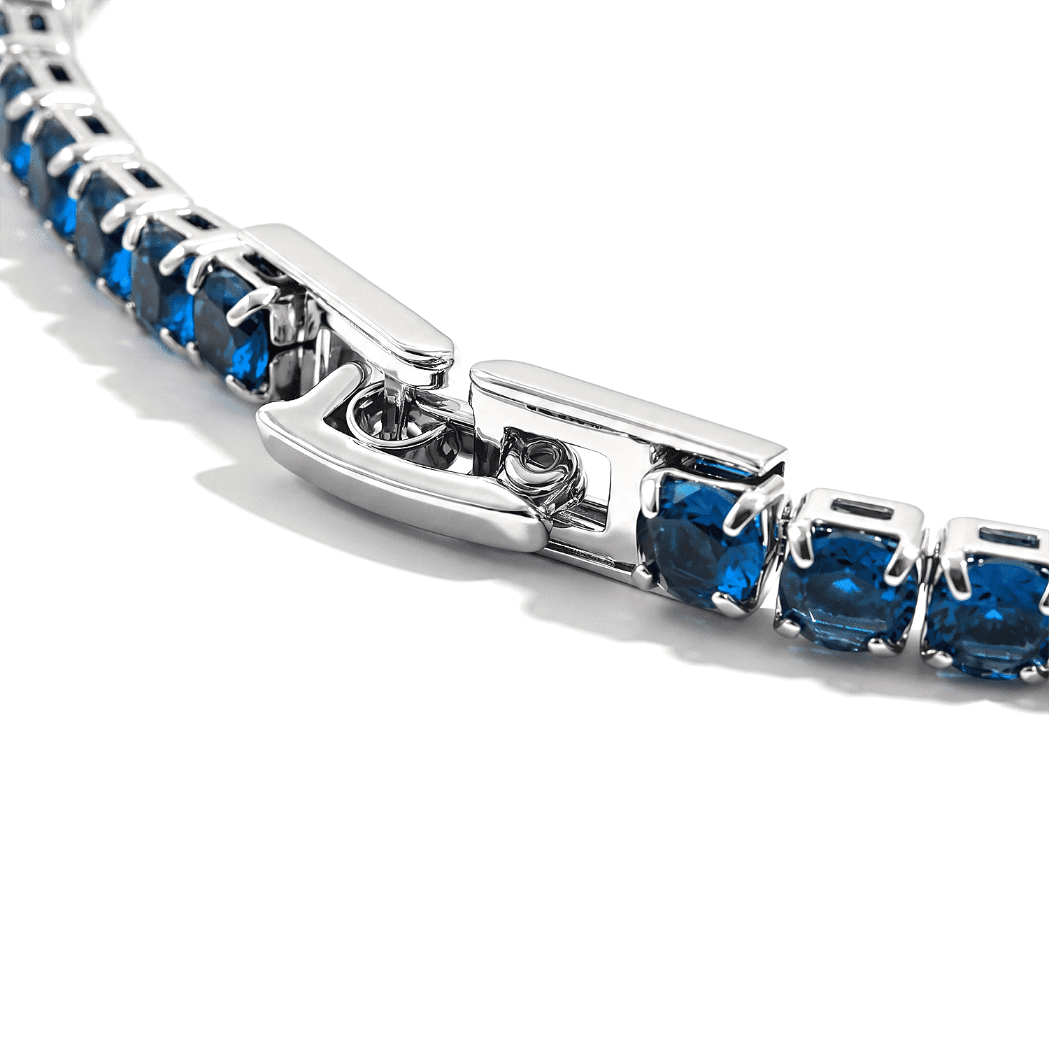 Simulated Blue Sapphire Diamond Tennis Bracelet in Silvertone (7.50 In)