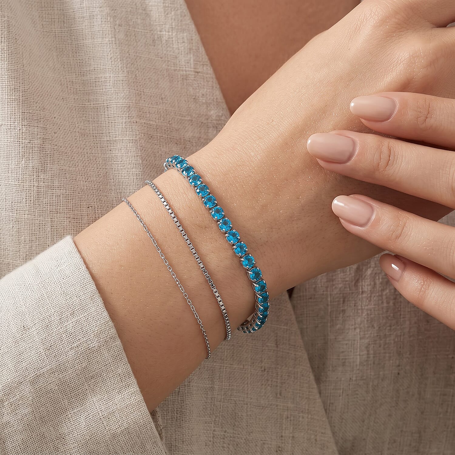 Simulated Aquamarine Diamond Tennis Bracelet in Silvertone (7.50 In)