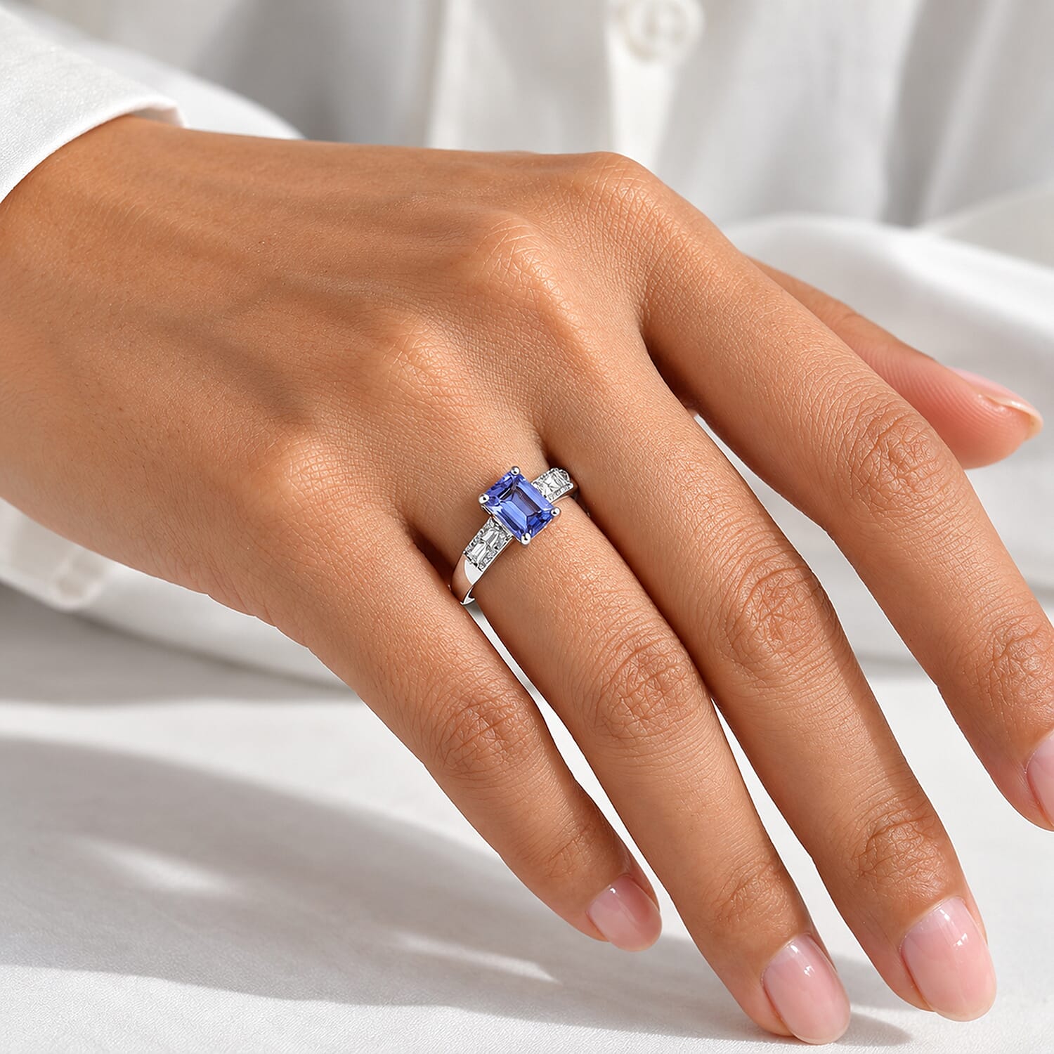 D'Joy Premium Tanzanite and White Zircon 1.50 ctw Art Deco Ring in Rhodium Over Sterling Silver (Size 9.0)