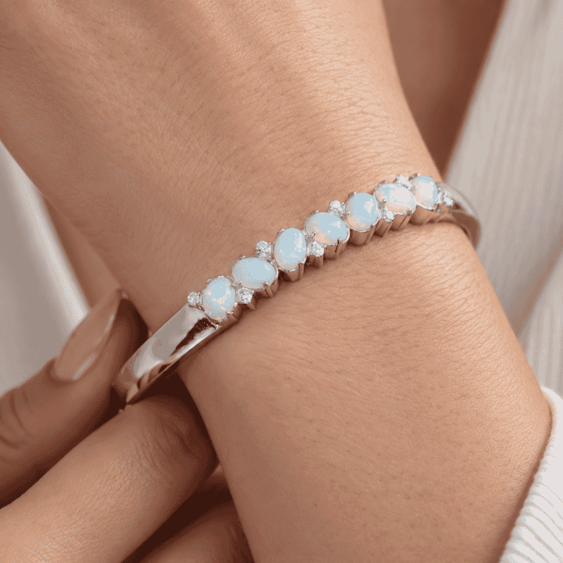 Doorbuster EverTrue AAA Ethiopian Welo Opal and Moissanite 4.20 ctw Bangle Bracelet in Stainless Steel (7.25 In)