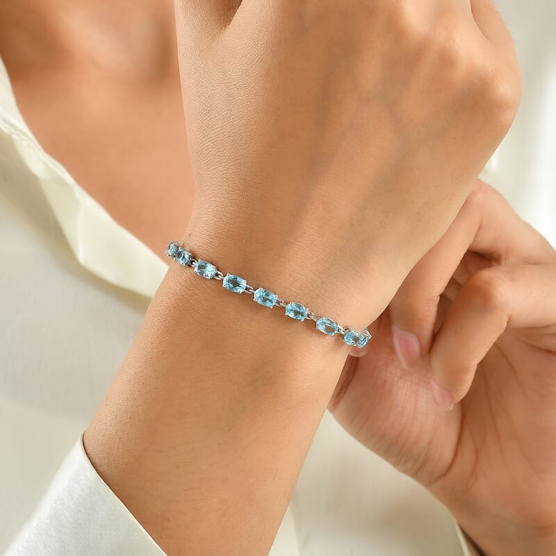 D'Joy Premium Swiss Blue Topaz 10.50 ctw Ocean Glow Bracelet in Rhodium Over Sterling Silver (6.50 In)