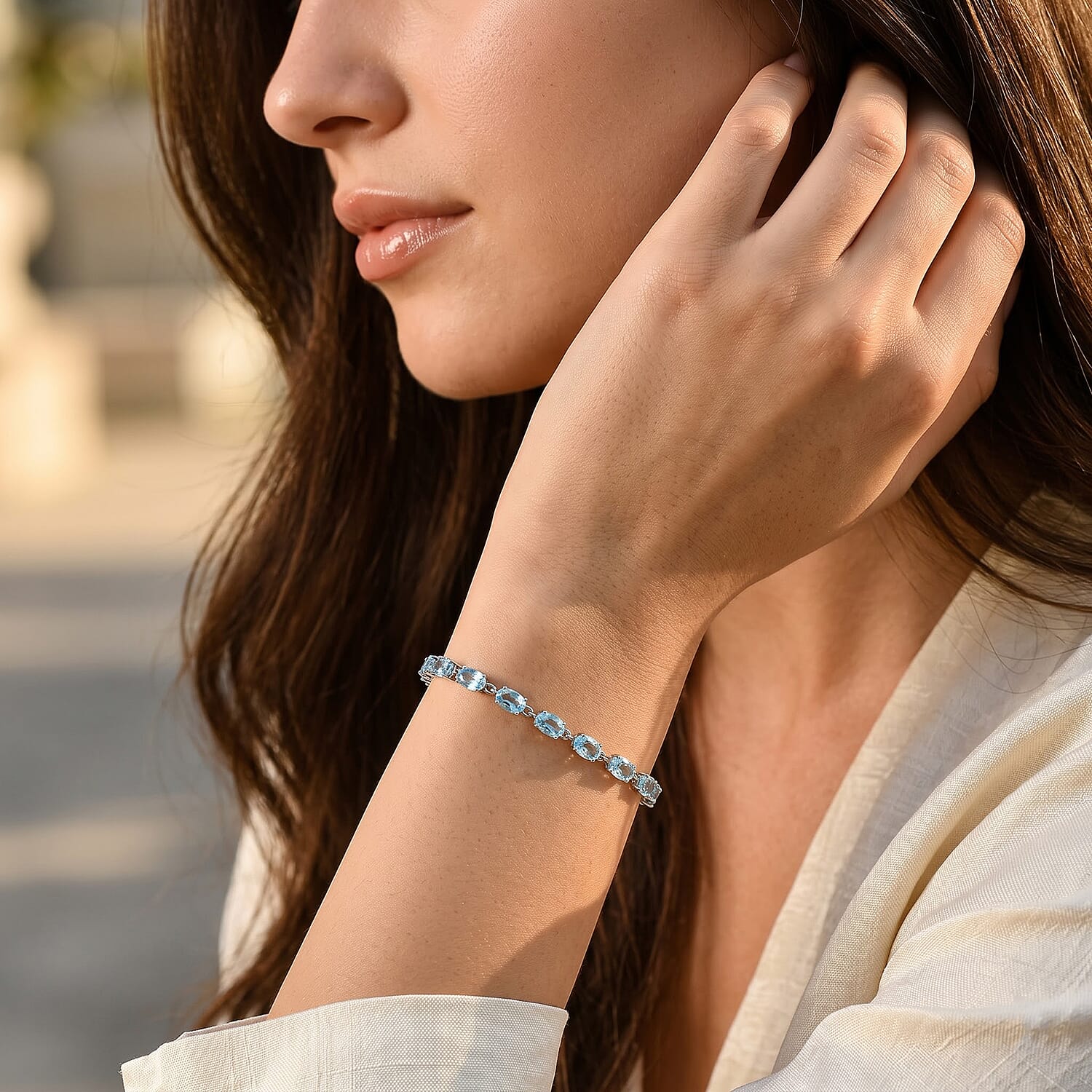 D'Joy Premium Swiss Blue Topaz 10.50 ctw Ocean Glow Bracelet in Rhodium Over Sterling Silver (6.50 In)