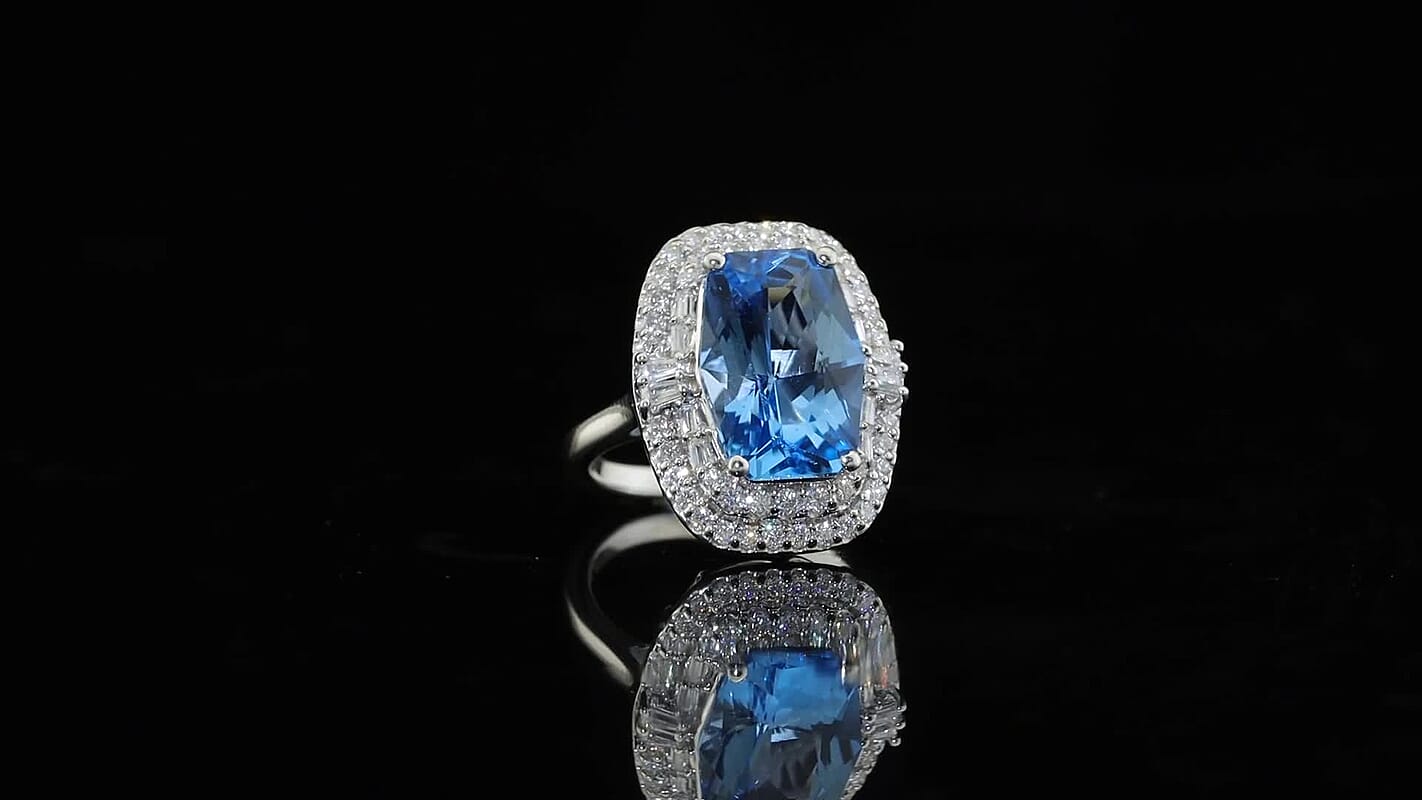 Certified and Appraised D''Joy Premium Swiss Blue Topaz, Moissanite Ring in Rhodium Over Sterling Silver (Size 10.0) 7.40 ctw