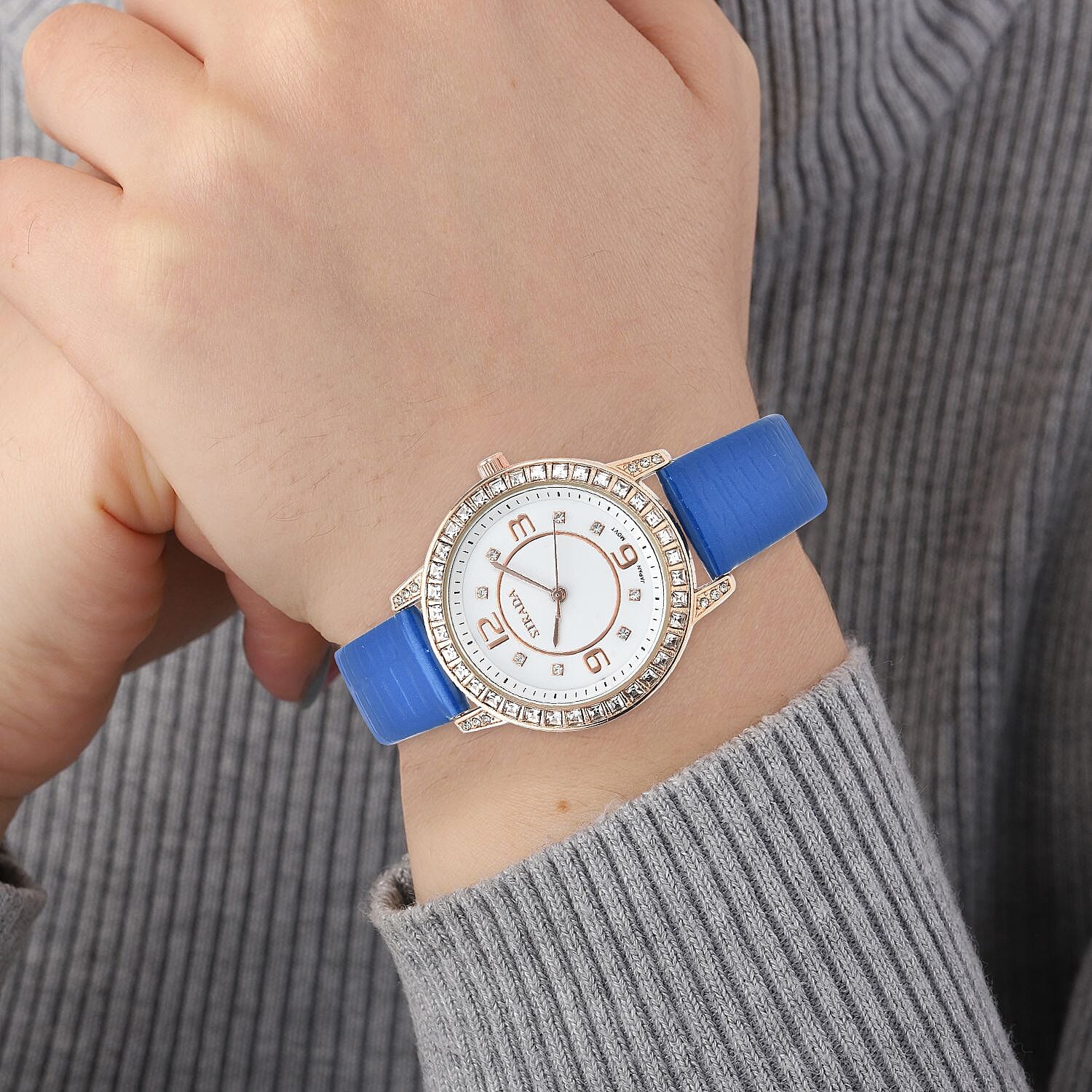 Strada Japanese Movement White Austrian Crystal Watch with Blue Faux Leather Strap (36mm) (7.00-8.25 Inches)