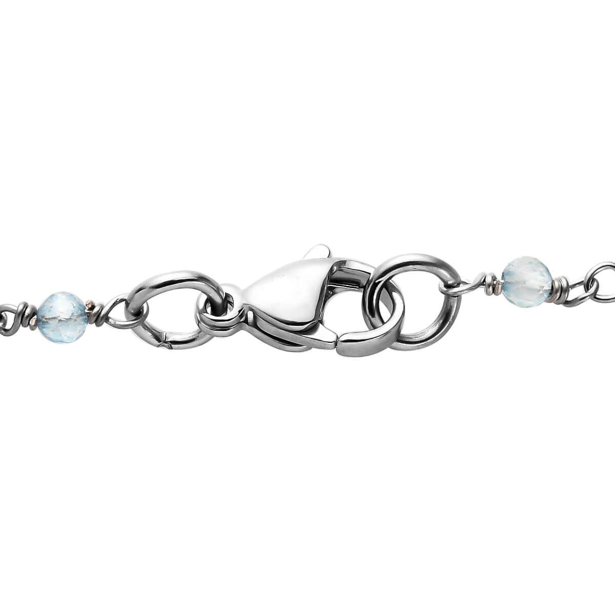 Karis Sky Blue Topaz Cross Pendant Necklace 20 Inches in Platinum Bond 17.80 ctw image number 4