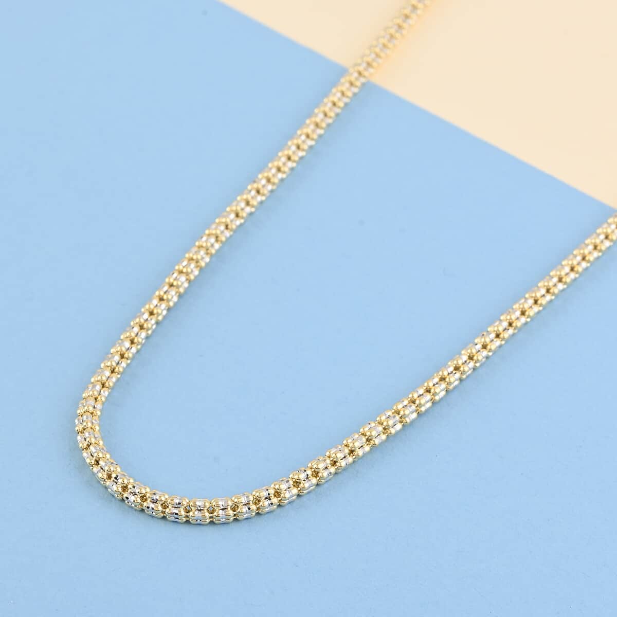 Vegas Closeout Deal 10K Yellow and White Gold 3mm Twotone Ice Necklace 22 Inches 18.80 Grams image number 1