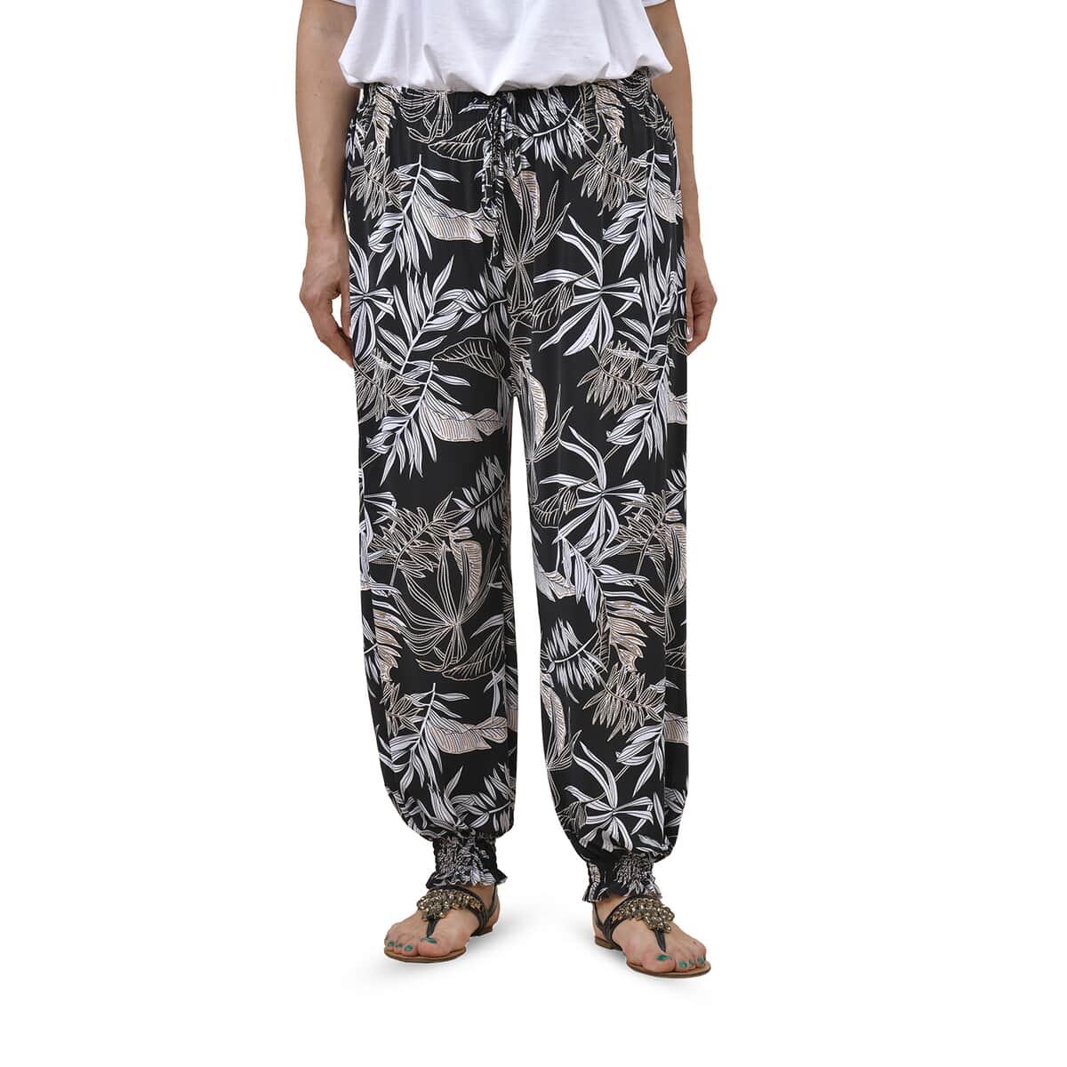 Buy Tamsy Black, White and Beige Leaves Print Pattern Trousers - One ...