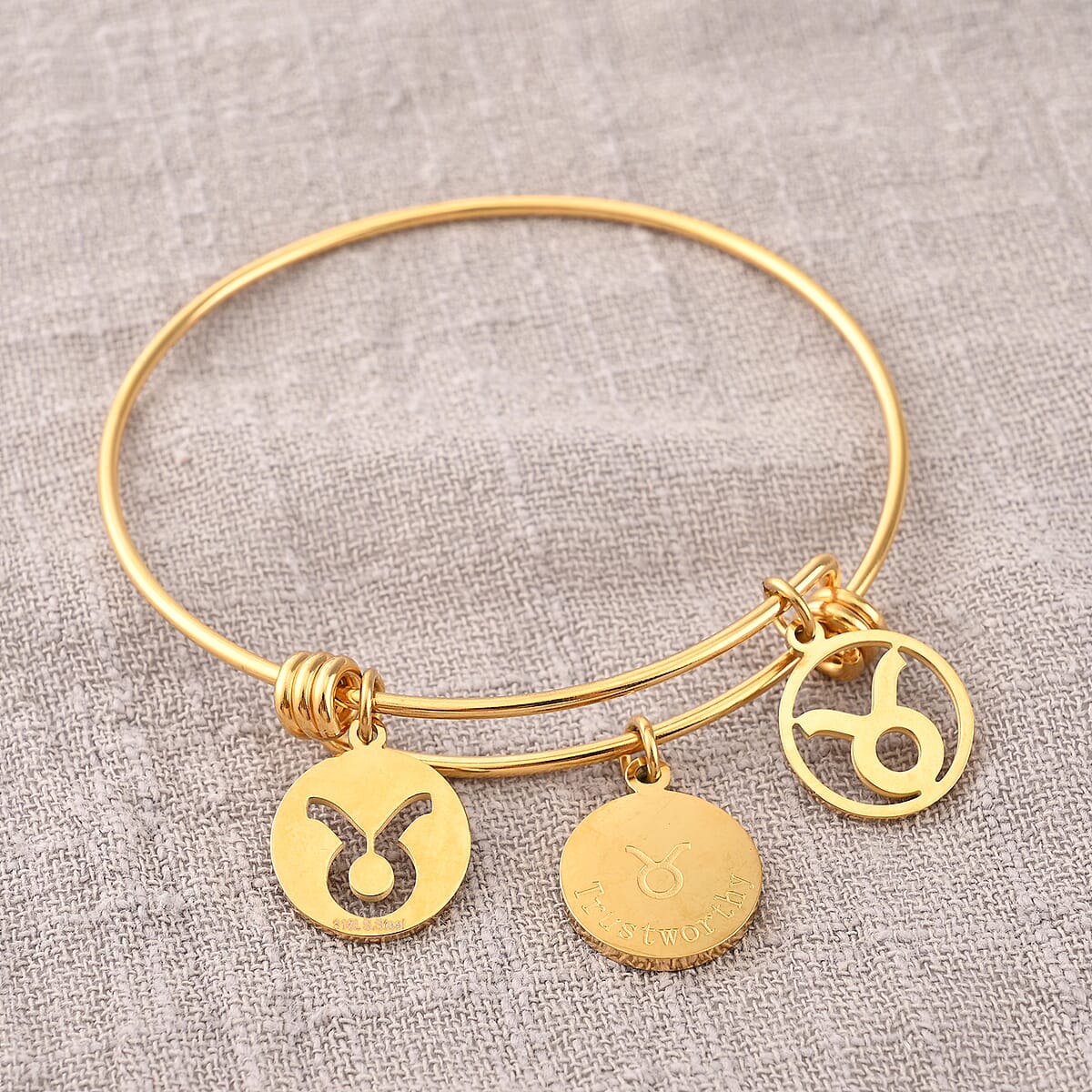 Taurus Zodiac Bangle Bracelet Gift Set in ION Plated Yellow Gold Stainless Steel (6-9 in) image number 2