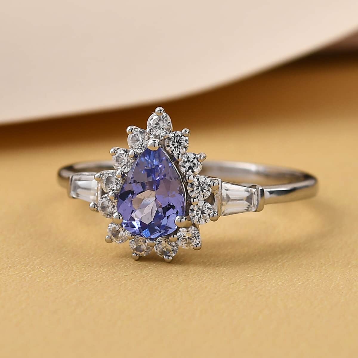 Tanzanite and Natural White Zircon Halo Ring in Platinum Over Sterling Silver (Size 6.0) 1.25 ctw image number 1