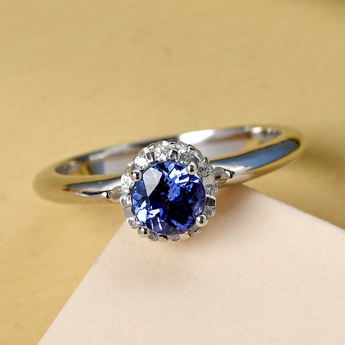 Tanzanite and Natural White Zircon Halo Ring in Platinum Over Sterling Silver (Size 10.0) 1.00 ctw image number 1