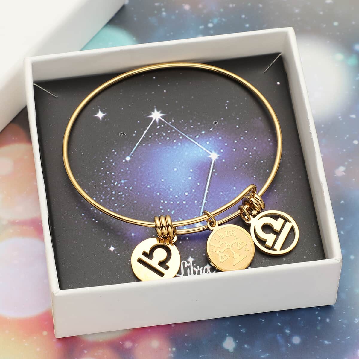 Libra Zodiac Bangle Bracelet Gift Set in ION Plated Yellow Gold Stainless Steel (6-9 in) image number 0