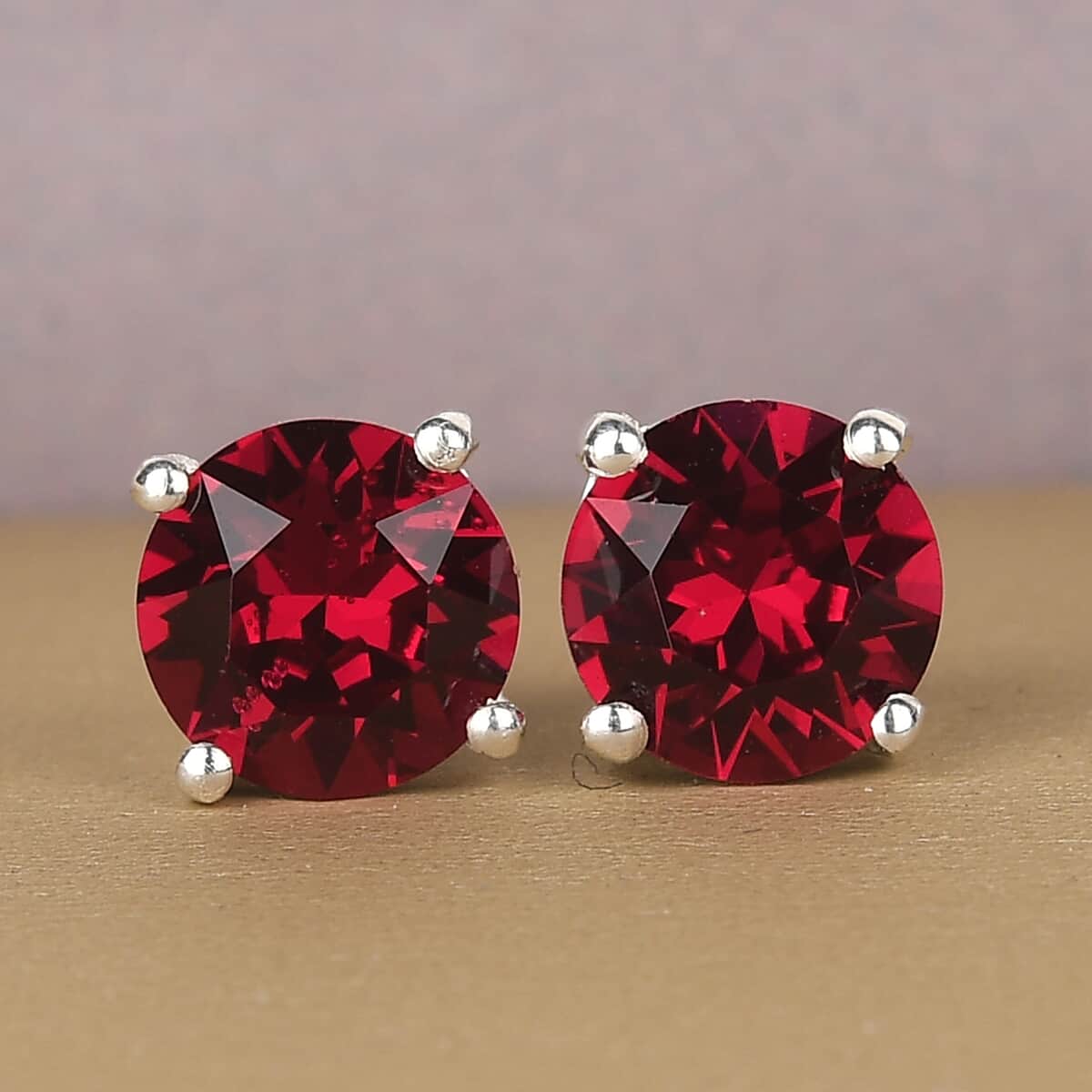 Ruby Color Crystal Solitaire Stud Earrings in Sterling Silver image number 1