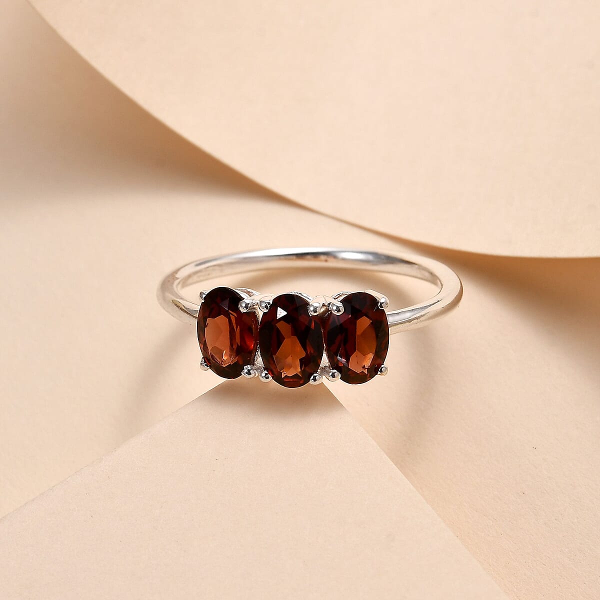 D'Joy Mozambique Garnet 1.75 ctw 3 Stone Ring in Sterling Silver (Size 9.0) image number 1
