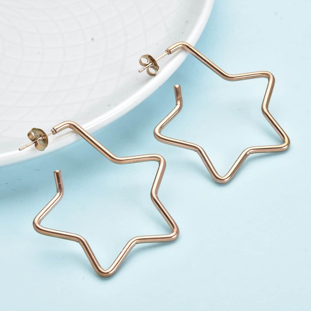 Celestial Star Shaped Hoop Earrings in ION Plated Rose Gold Stainless Steel image number 1