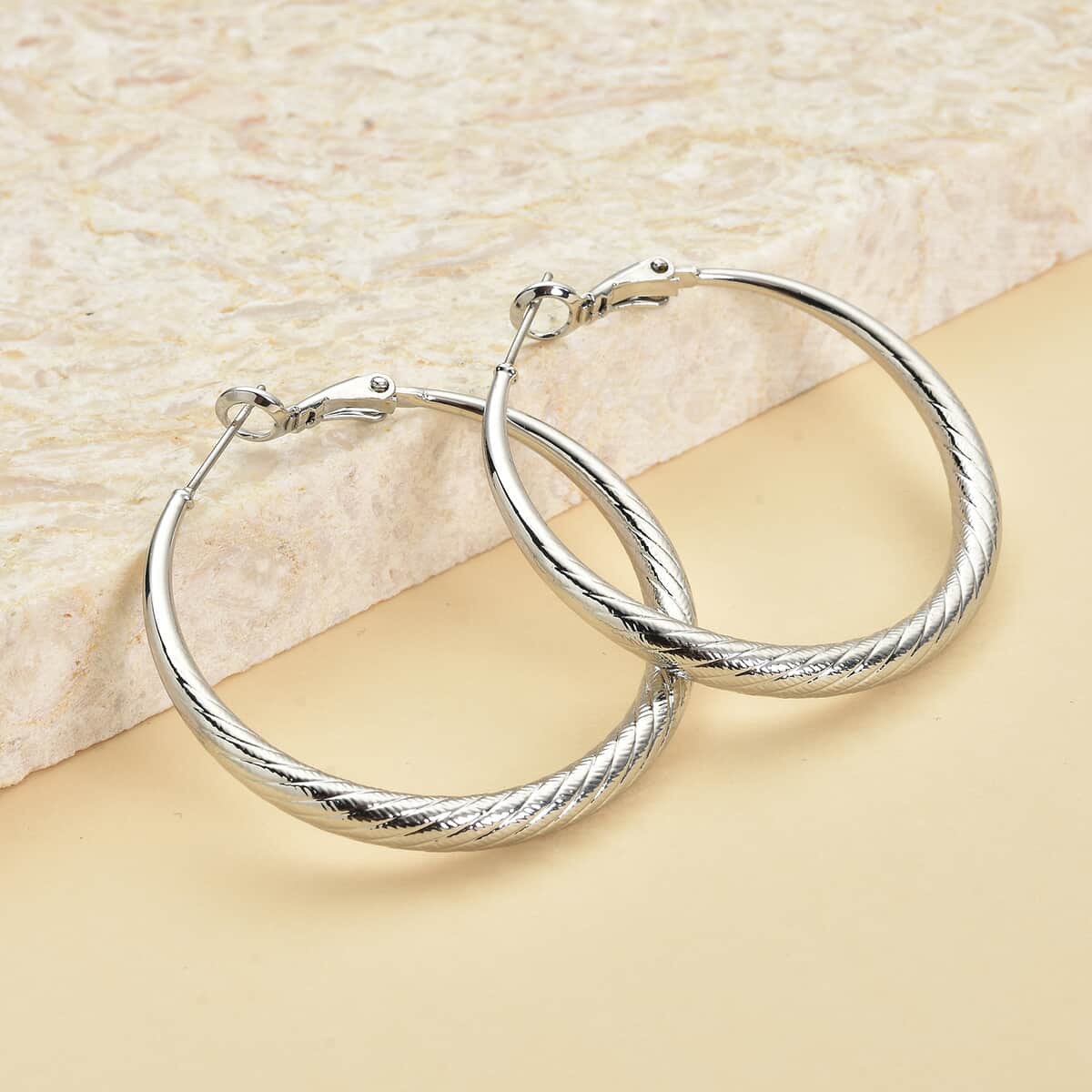 Hoop Earrings in Silvertone image number 1