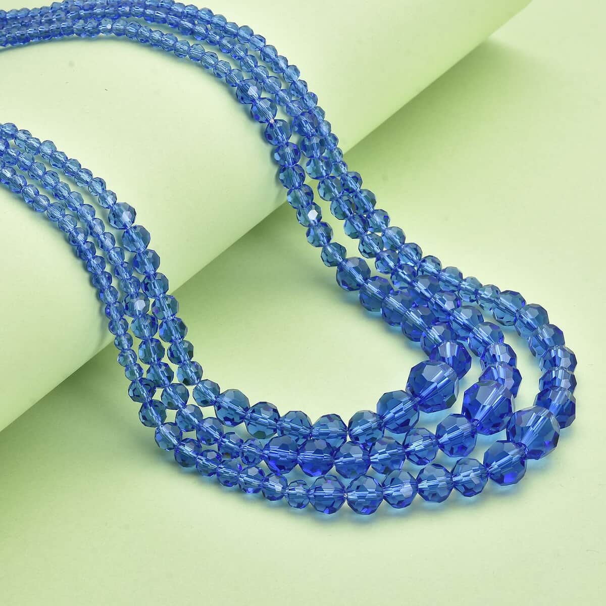 Tanzanite Blue Color Glass Beaded 3 Row Necklace 20-22 Inches in Silvertone image number 1