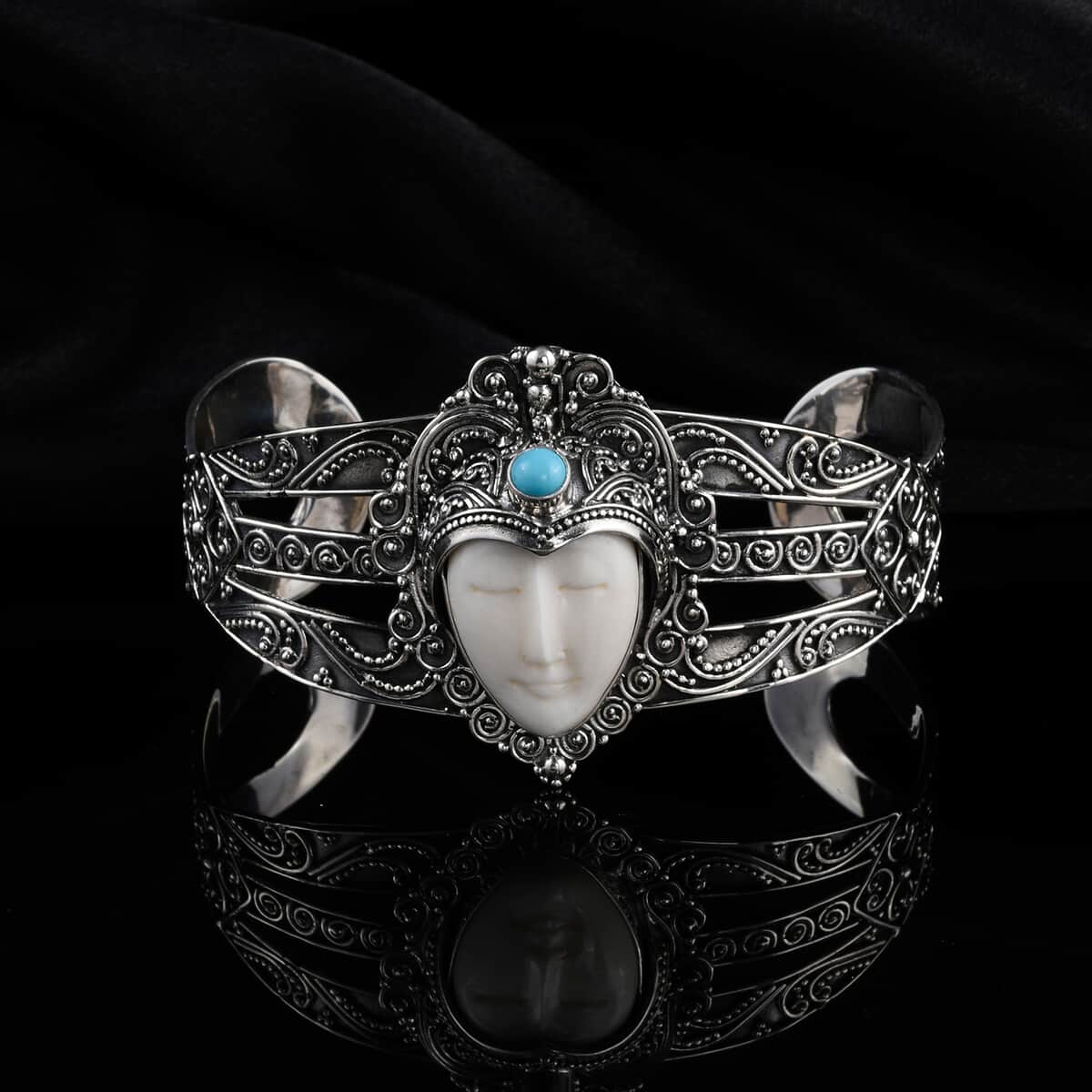 DOORBUSTER BALI GODDESS Carved Bone, Natural Arizona Sleeping Beauty Turquoise Cuff Bracelet in Sterling Silver (7.25 In) (39.55 g) 0.65 ctw image number 1