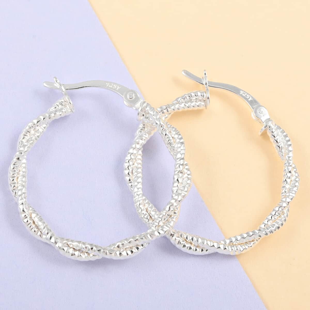 Sterling Silver Twisted Hoop Earrings 3 Grams image number 1