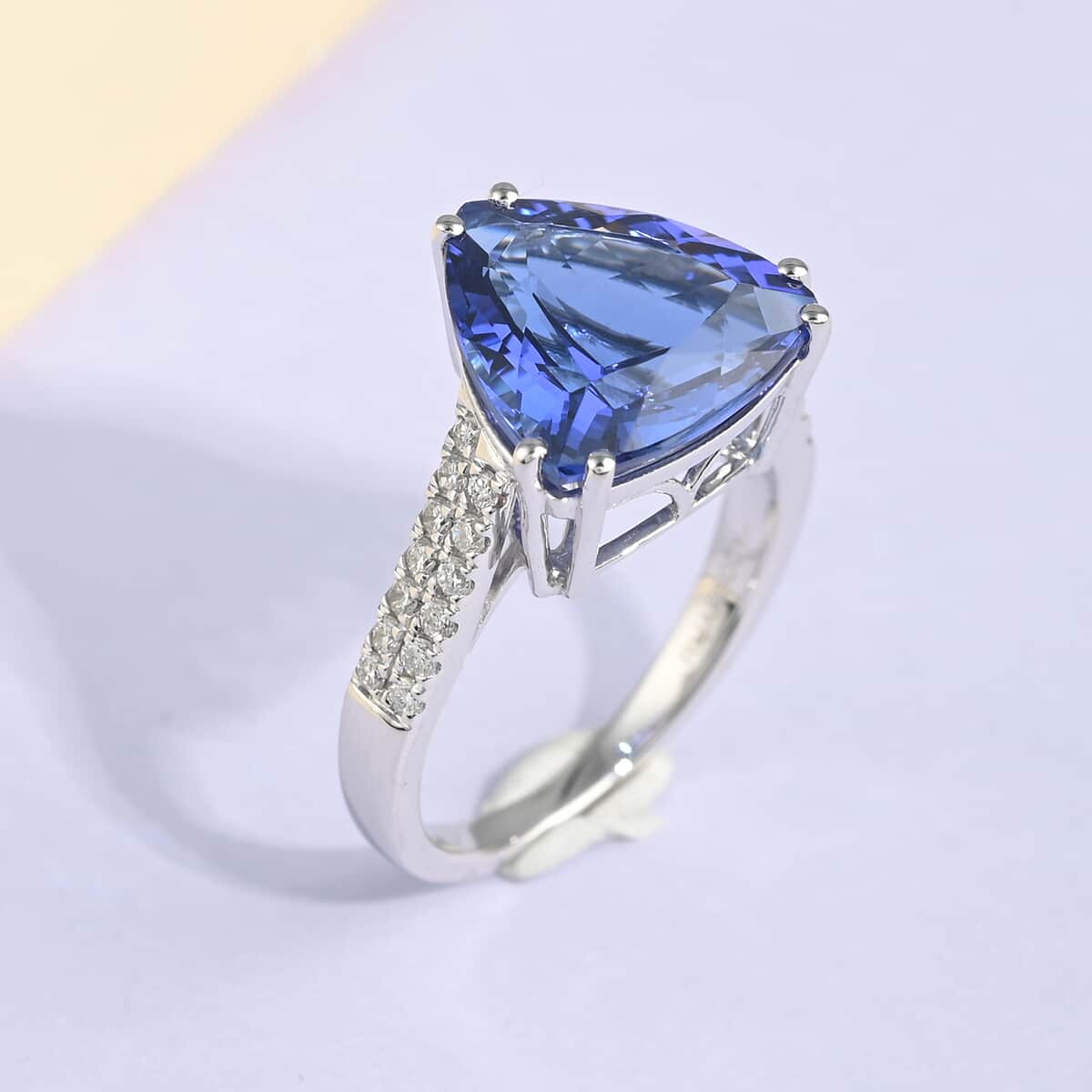 Certified RHAPSODY 950 Platinum AAAA Tanzanite and E-F VS Diamond Solitaire Ring 6.10 Grams 5.80 ctw image number 1