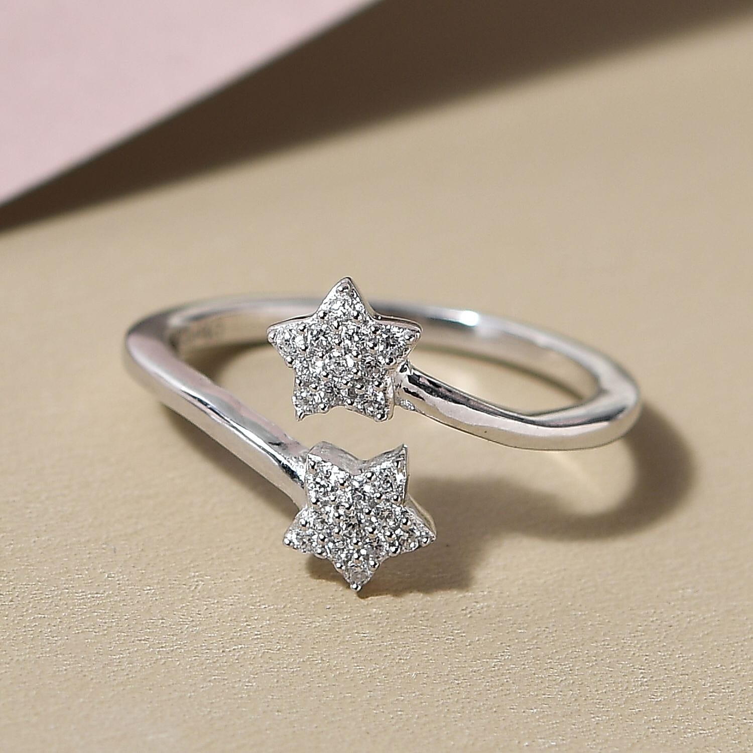 Luxuriant Lab Grown Diamond G-H SI Star Bypass Ring in Platinum Over Sterling Silver (Size 10.0) 0.15 ctw