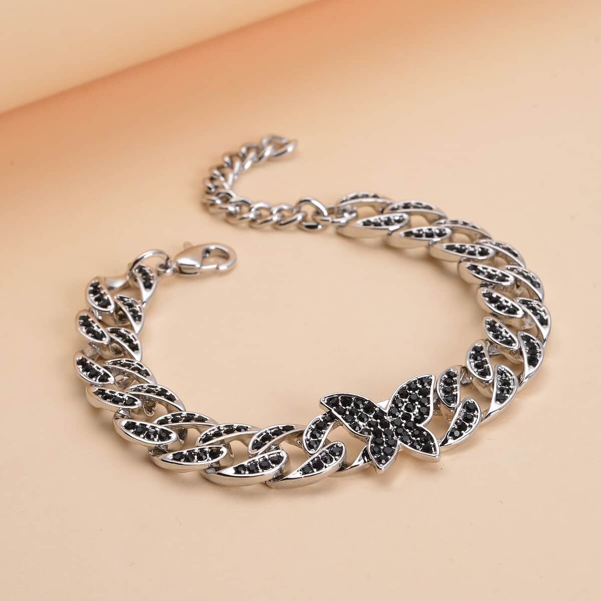 Black Austrian Crystal Curb Chain Bracelet with Butterfly Charm (7.5-9.5In) in Silvertone image number 1