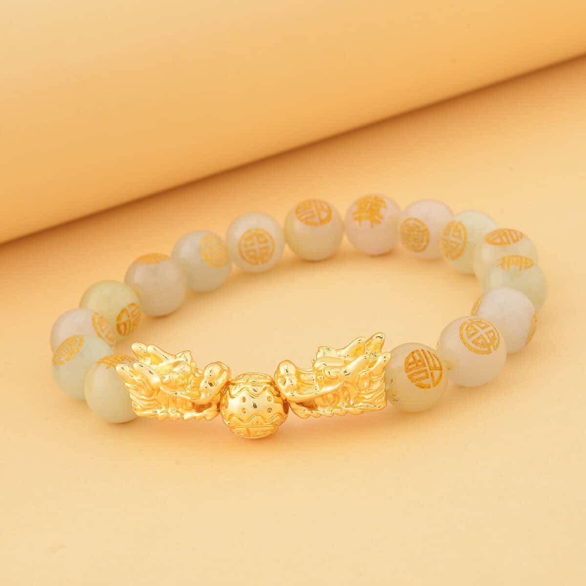 White Jade Carved Feng Shui Dragon Stretch Bracelet in Goldtone 112.00 ctw image number 1