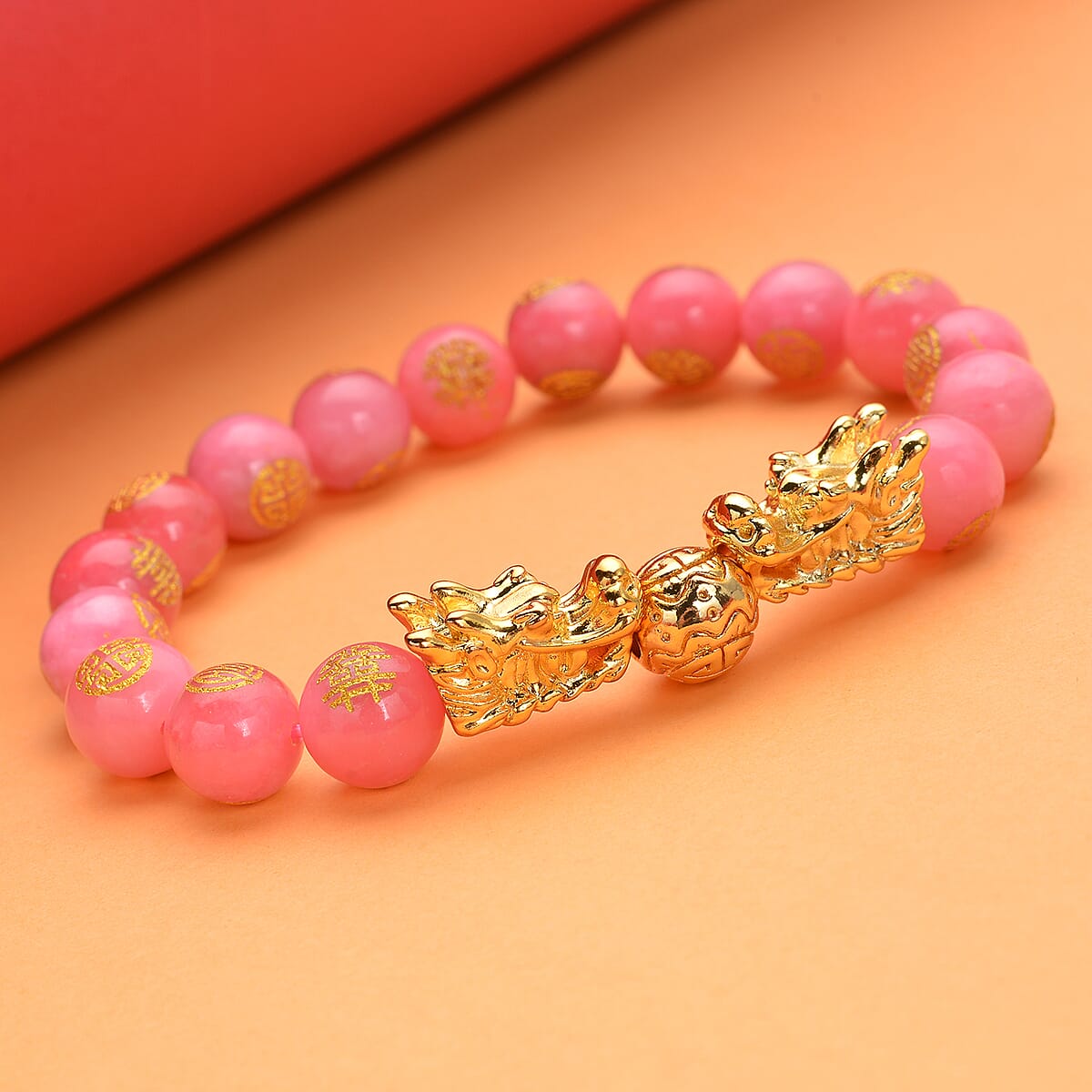 Pink Jade Carved Feng Shui Dragon Stretch Bracelet in Goldtone 112.00 ctw image number 1
