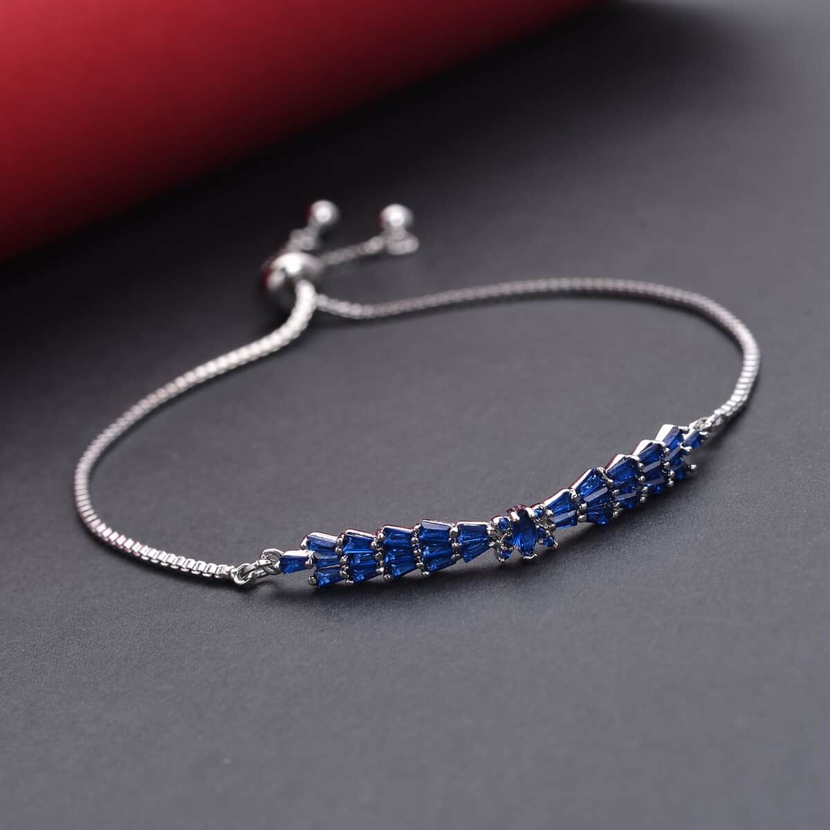 Simulated Blue Sapphire Bolo Bracelet in Silvertone 2.00 ctw image number 1