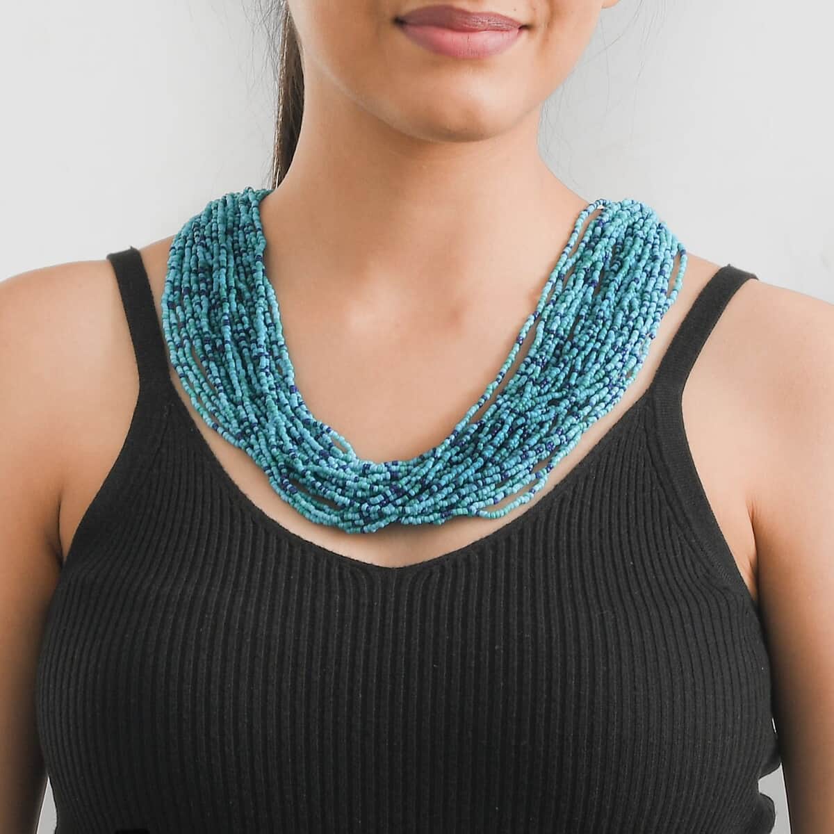 Turquoise Seed Beaded Multi Layered Necklace 20-22 inches in Goldtone image number 1