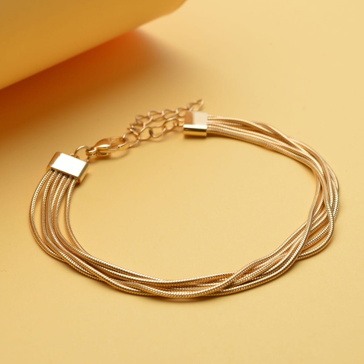 Multi Row Snake Chain Bracelet in ION Plated YG Stainless Steel (7.50-9.00In) image number 1