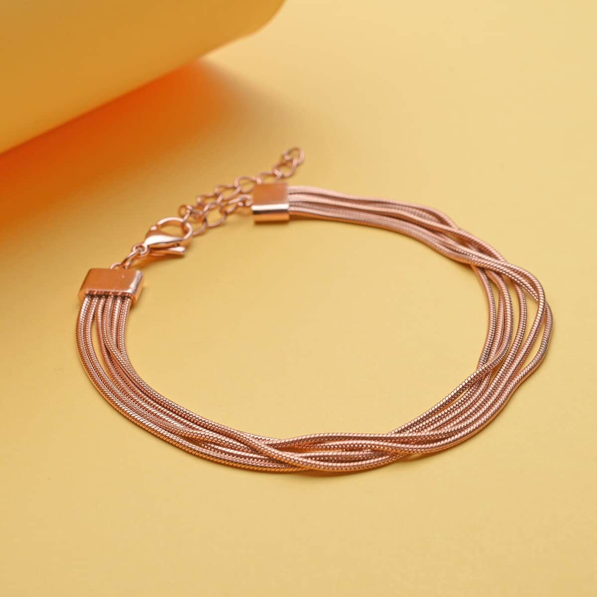 Multi Row Snake Chain Bracelet in ION Plated Rose Gold Stainless Steel (7.50-9.00In) image number 1