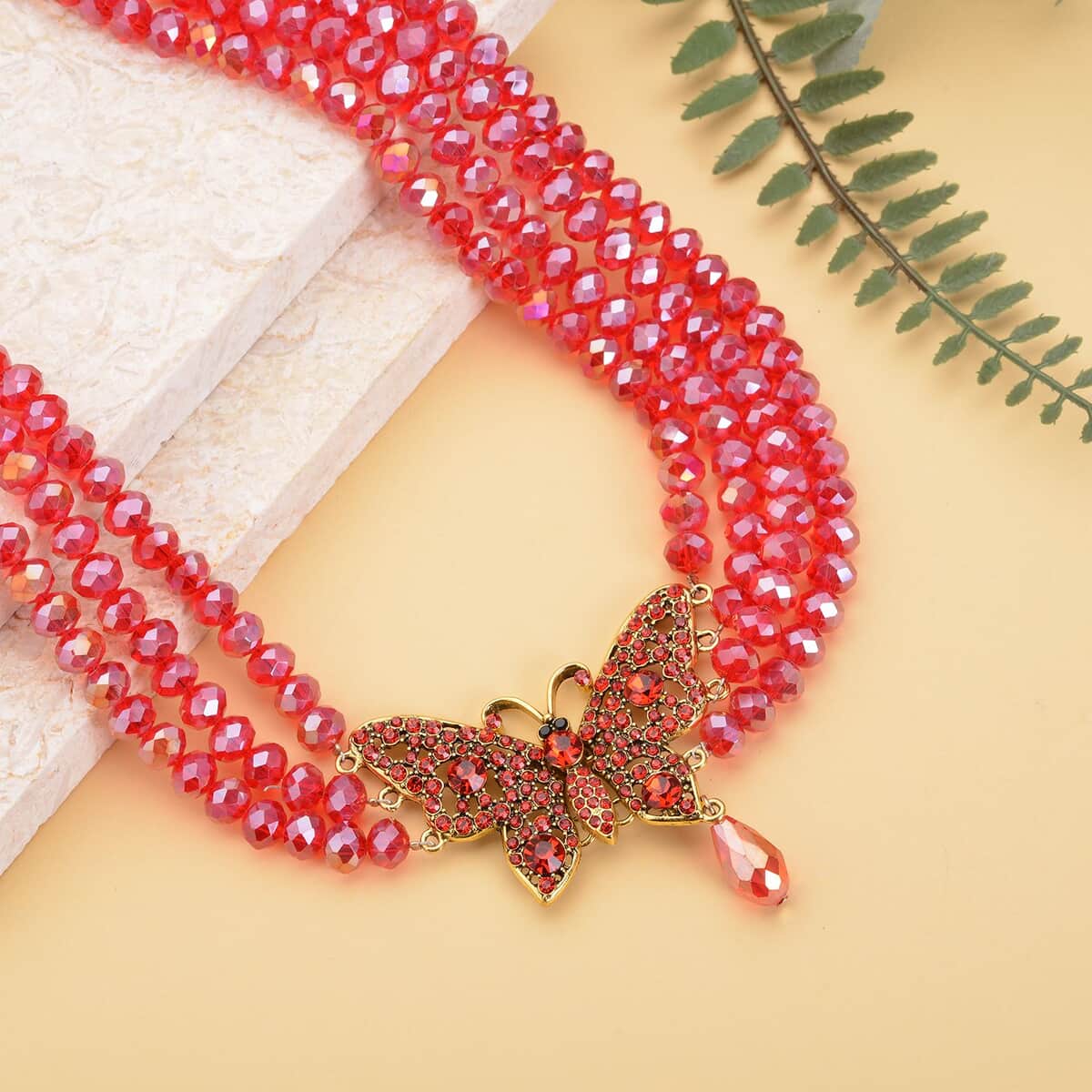 Red Glass, Red and Black Austrian Crystal Beaded Multi Layered Butterfly Necklace (20-22 Inches) in Goldtone image number 1