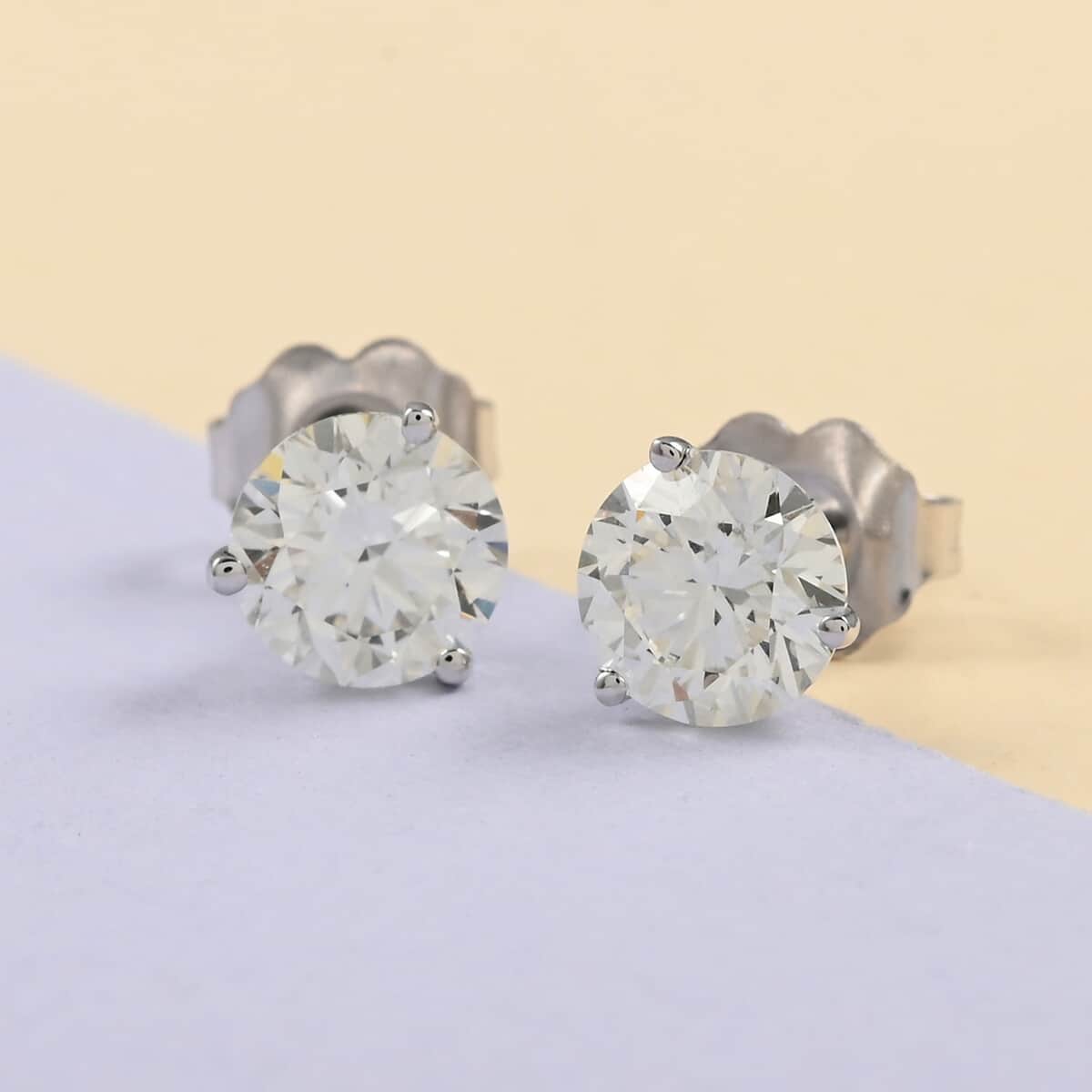 NY Closeout 14K White Gold G-H VS-SI Luxuriant Lab Grown Diamond Solitaire Stud Earrings 1.50 ctw image number 1