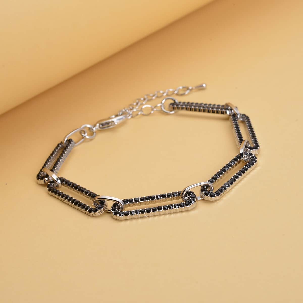 Black Austrian Crystal Paper Clip Chain Bracelet in Silvertone (7.50-9.50In) image number 1