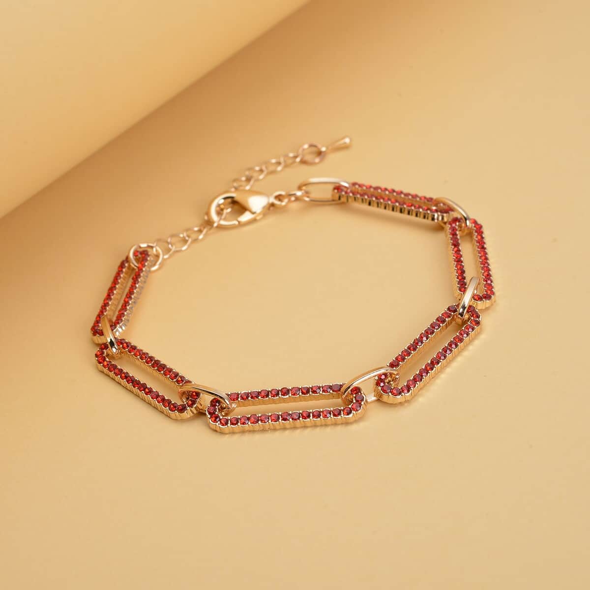Red Austrian Crystal Paper Clip Chain Bracelet in Goldtone (7.50-9.50In) image number 1