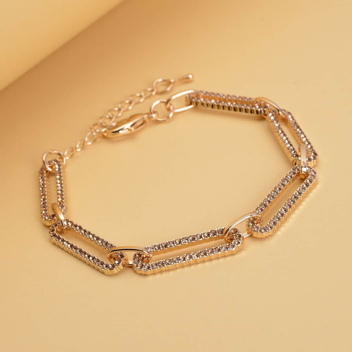 Champagne Austrian Crystal Paper Clip Chain Bracelet in Goldtone (7.50-9.50In) image number 1