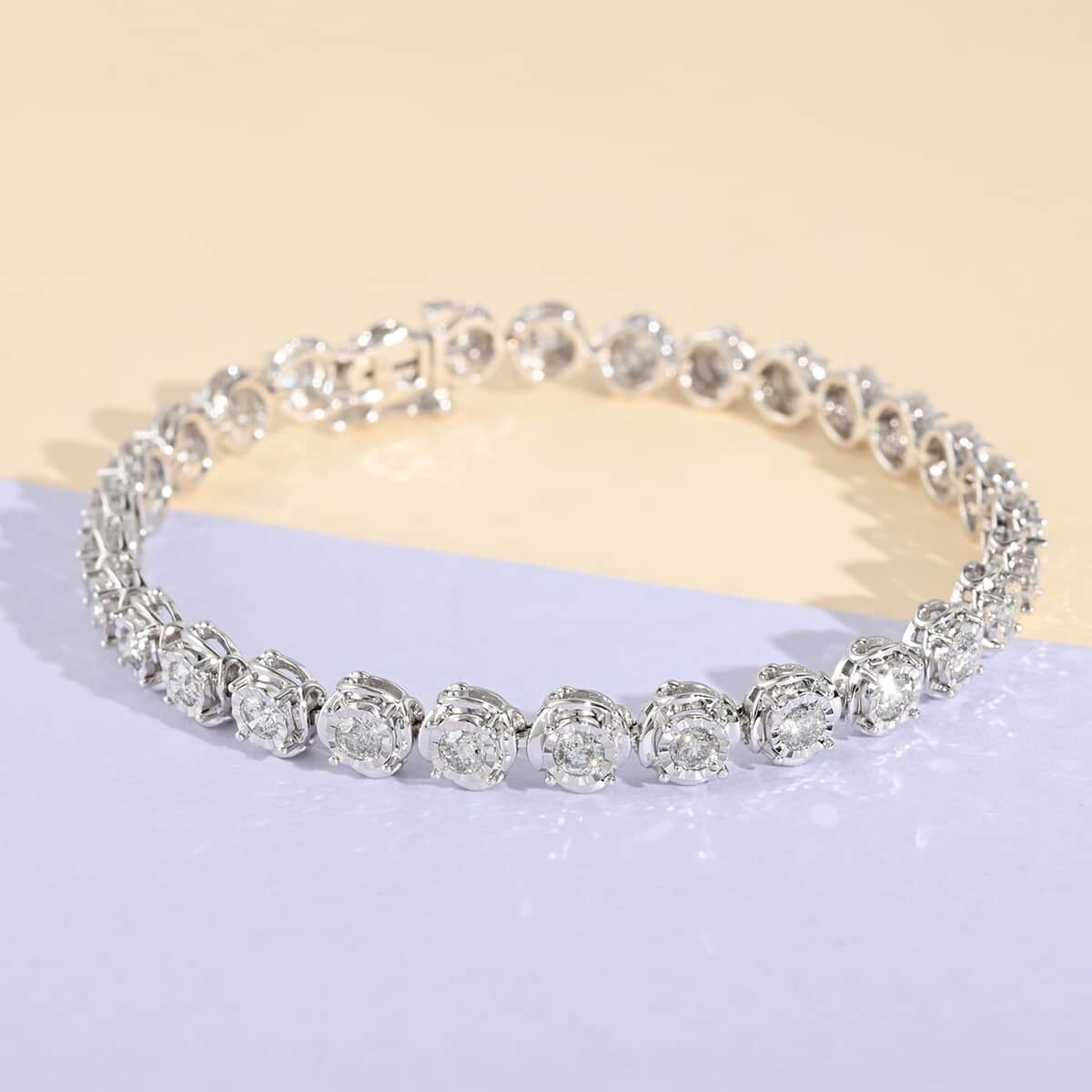 NY Closeout 10K White Gold G-H SI2-I1 Diamond Tennis Bracelet (7.25 In) 11.90 Grams 3.00 ctw image number 1