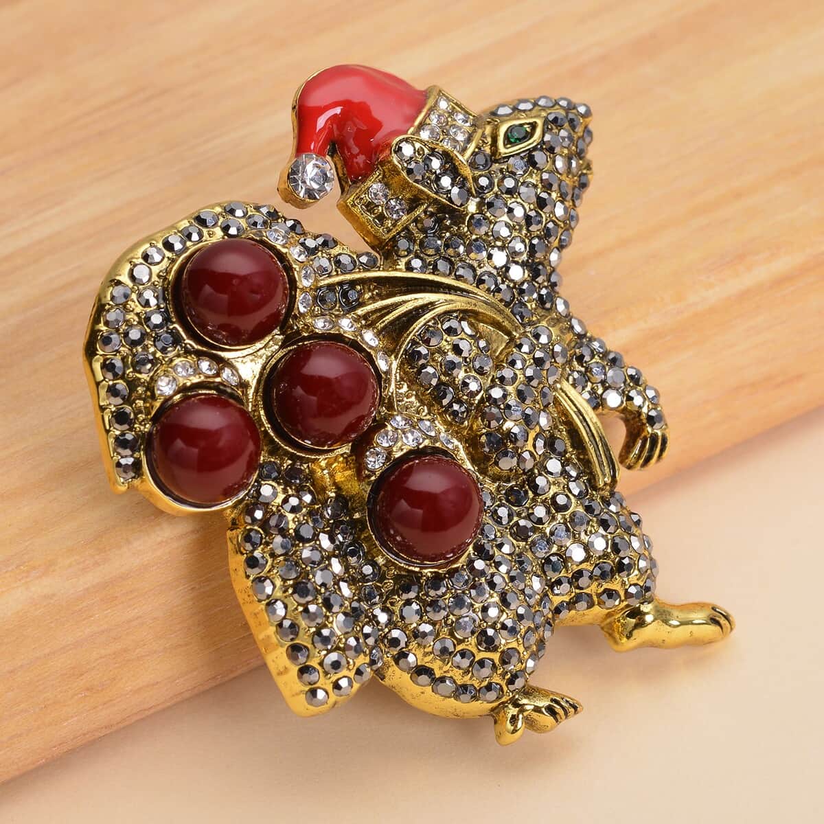 Simulated Red Color Resin, Multi Color Austrian Crystal, Red Enameled Santa Cap Brooch in Goldtone 12.00 ctw image number 1