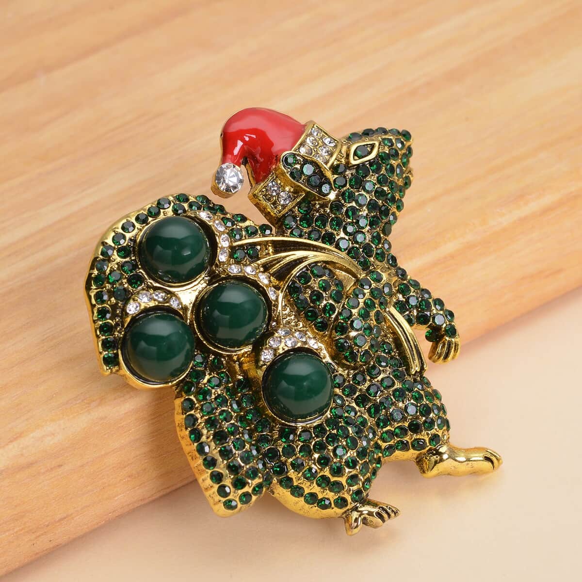 Simulated Green Color Resin, White & Green Austrian Crystal, Red Enameled Santa Cap Brooch in Goldtone 32.00 ctw image number 1